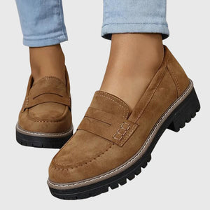 Gloria suede penny loafers in Brown worn with cropped jeans