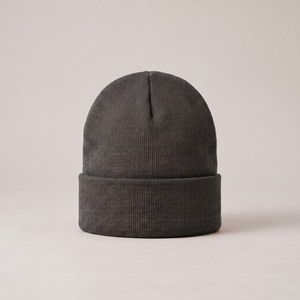 Hattie knit beanie in Gray with a folded cuff on a light gray studio backdrop