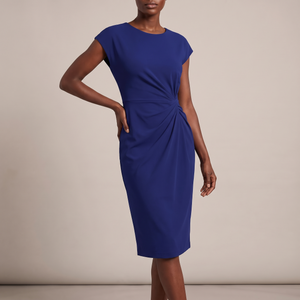 Hester ruched sheath dress in Dark Blue on a light gray studio backdrop