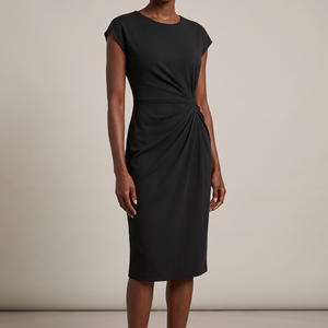 Hester ruched sheath dress in Black on a light gray studio backdrop