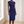 Hester ruched sheath dress in Dark Blue by a window in a bright room