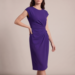Hester ruched sheath dress in Purple on a light gray studio backdrop