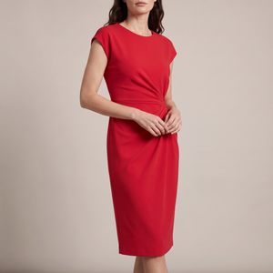 Hester ruched sheath dress in Red on a light gray studio backdrop
