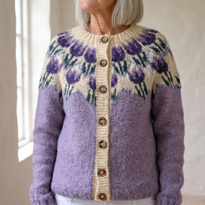 Close view of the Honorine cardigan showing the knitted tulip yoke and button band