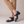 Hortense leather Mary Jane pumps in Blue on a light gray studio backdrop