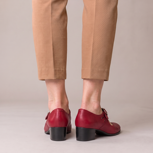 Hortense leather Mary Jane pumps in Red on a light gray studio backdrop