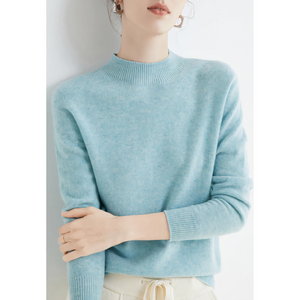 Imogen cashmere mock neck sweater in Sky Blue on a model