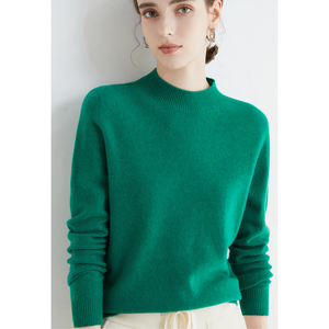 Imogen cashmere mock neck sweater in Green on a model