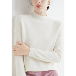 Imogen cashmere mock neck sweater in White on a model