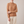 Imogen cashmere mock neck sweater in Camel worn with cream wide leg trousers