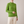 Imogen cashmere mock neck sweater in Light Green worn with cream wide leg trousers