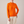 Imogen cashmere mock neck sweater in Orange worn with cream wide leg trousers