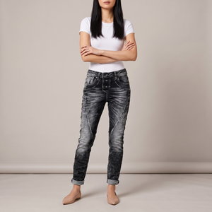 Irene skinny jeans in Black on a light gray studio backdrop