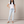 Irene skinny jeans in Light Blue on a light gray studio backdrop