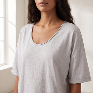 Close view of the scoop neckline and rolled sleeve edge on the Jemima loose scoop neck blouse in Light Gray