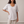 Jemima loose scoop neck blouse in Light Gray on a light gray studio backdrop
