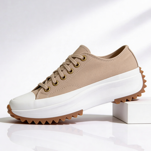 Single Laetitia sneaker in Tan on a white block