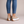 Laetitia canvas platform sneakers in Tan seen from behind on a light gray studio backdrop