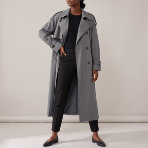Lillian long trench coat in Gray on a light gray studio backdrop