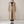 Lillian long trench coat in Khaki on a light gray studio backdrop