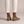 Lorelei slip on flats in Olive seen from behind on a light gray studio backdrop