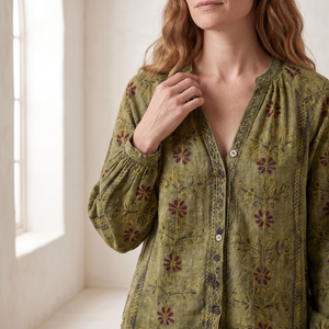Close view of the trimmed V neckline and buttons on the Lucille blouse in Olive
