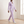 Marianne tracksuit set in Lavender worn walking across a pale oak floor