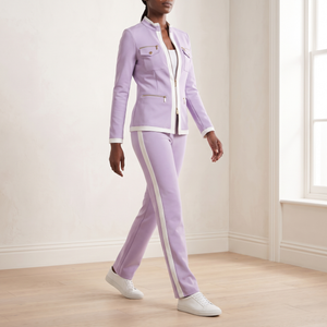 Marianne tracksuit set in Lavender worn walking across a pale oak floor