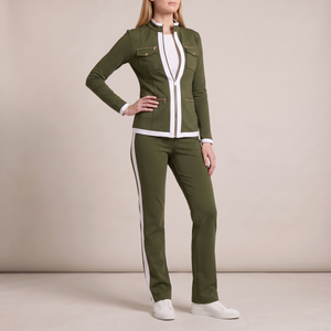 Marianne tracksuit set in Olive on a light gray studio backdrop