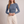 Maribel long sleeve crop top in Blue on a light gray studio backdrop
