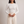 Maribel long sleeve crop top in White on a light gray studio backdrop