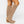 Marlene knee high suede boots in Beige with a wood tone block heel, side view of the inside zip
