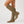 Marlene knee high suede boots in Dark Green with the inside zip and buckle strap in view