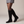 Marlene knee high suede boots in Black with a black block heel and stud ankle strap