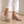 Close view of the rhinestone toe bands on the Martina low block heel sandals in Silver