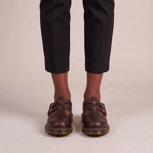 Matilda leather Mary Jane flats in Brown seen from the front on a light gray studio backdrop