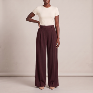 Nadine wide leg pants in Burgundy on a light gray studio backdrop