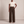 Nadine wide leg pants in Dark Brown on a light gray studio backdrop