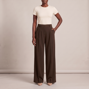 Nadine wide leg pants in Dark Brown on a light gray studio backdrop