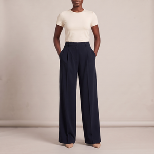 Nadine wide leg pants in Dark Navy on a light gray studio backdrop