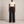 Nadine wide leg pants in Black on a light gray studio backdrop