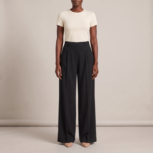 Nadine wide leg pants in Black on a light gray studio backdrop