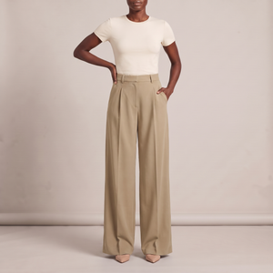 Nadine wide leg pants in Khaki on a light gray studio backdrop