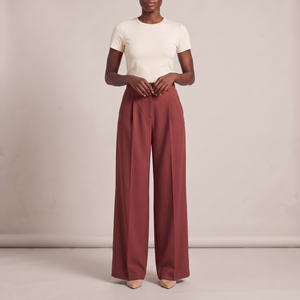 Nadine wide leg pants in Red on a light gray studio backdrop