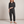 Nerea linen blend jumpsuit in Black on a light gray studio backdrop