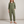 Nerea linen blend jumpsuit in Green on a light gray studio backdrop