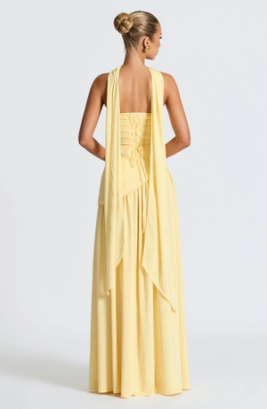 Back of the Ondine gown in Yellow showing the laced bodice