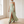 Ondine strapless maxi gown in Mint Green walking, the front slit open