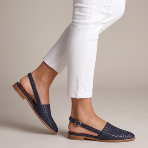 Ornella woven slingback flats in Blue on a light gray studio backdrop