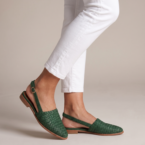 Ornella woven slingback flats in Green on a light gray studio backdrop